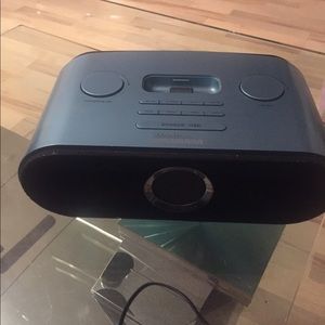 Portable alarm clock/ radio with AA batteries